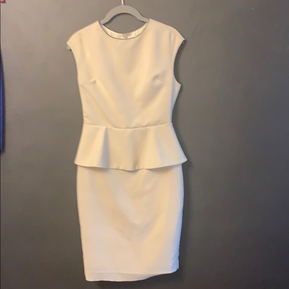 Fabulous peplum dress with piping detail